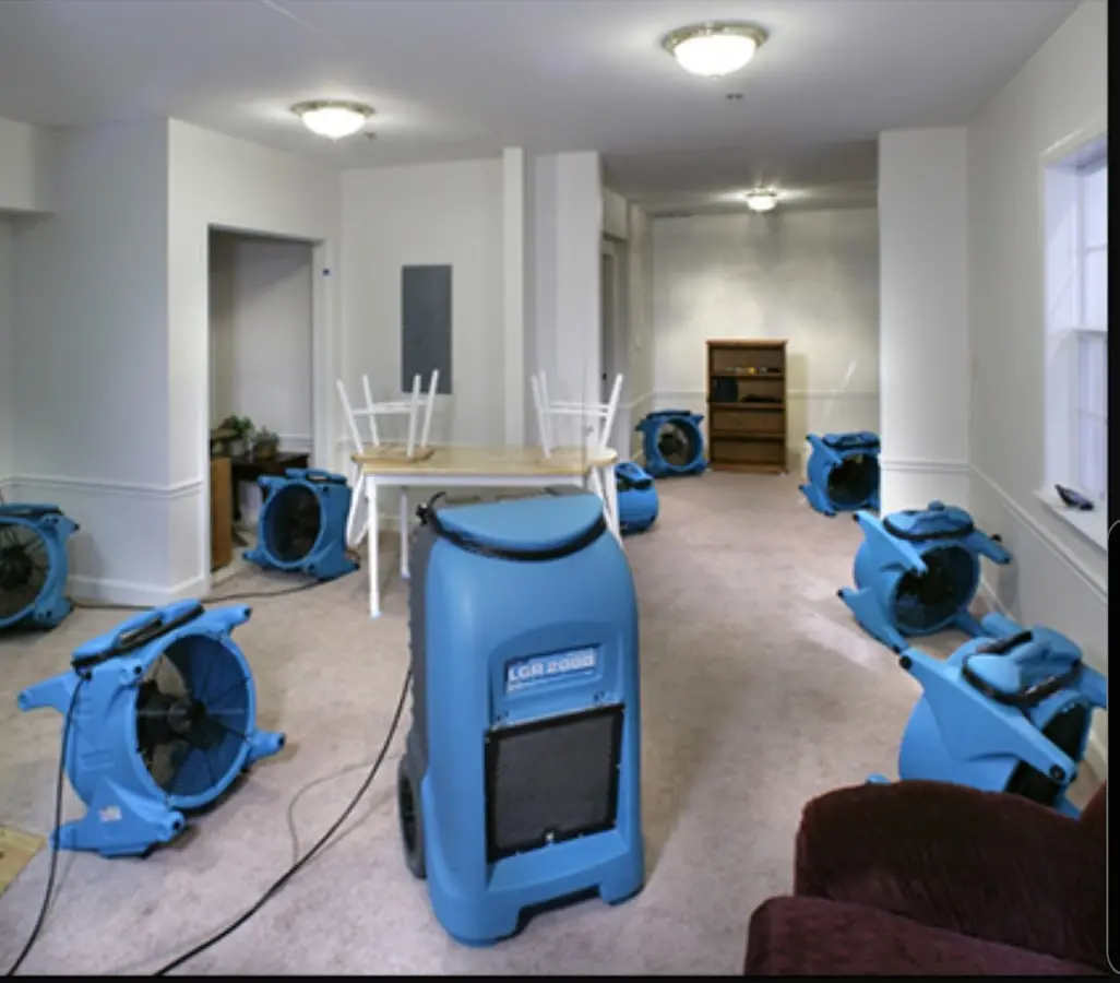 Air movers and dehumidifier setup for Water Damage Restoration in Guadalupe